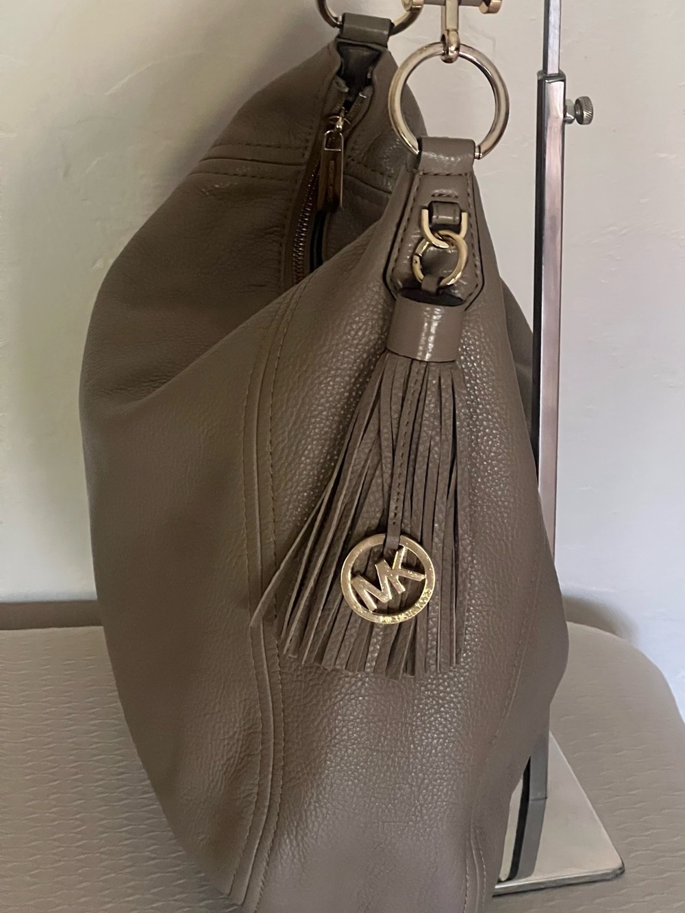 Michael Kors Taupe Soft Pebbled Leather Tassel Hobo with Gold Hardware